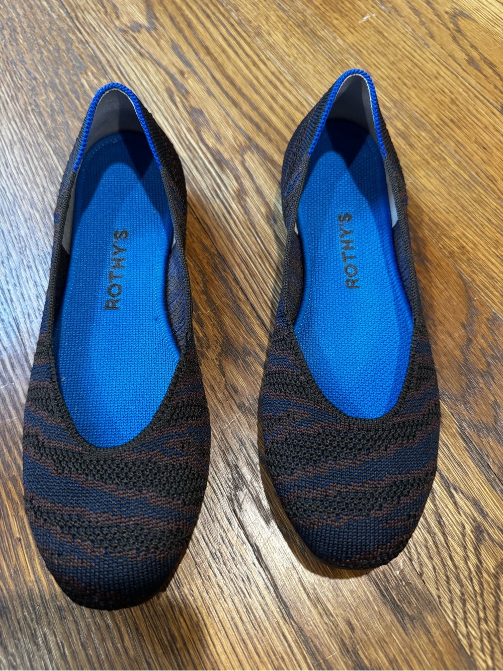 Rothy's Black Knit Flats with Blue Insole and Brown and Blue Stripes